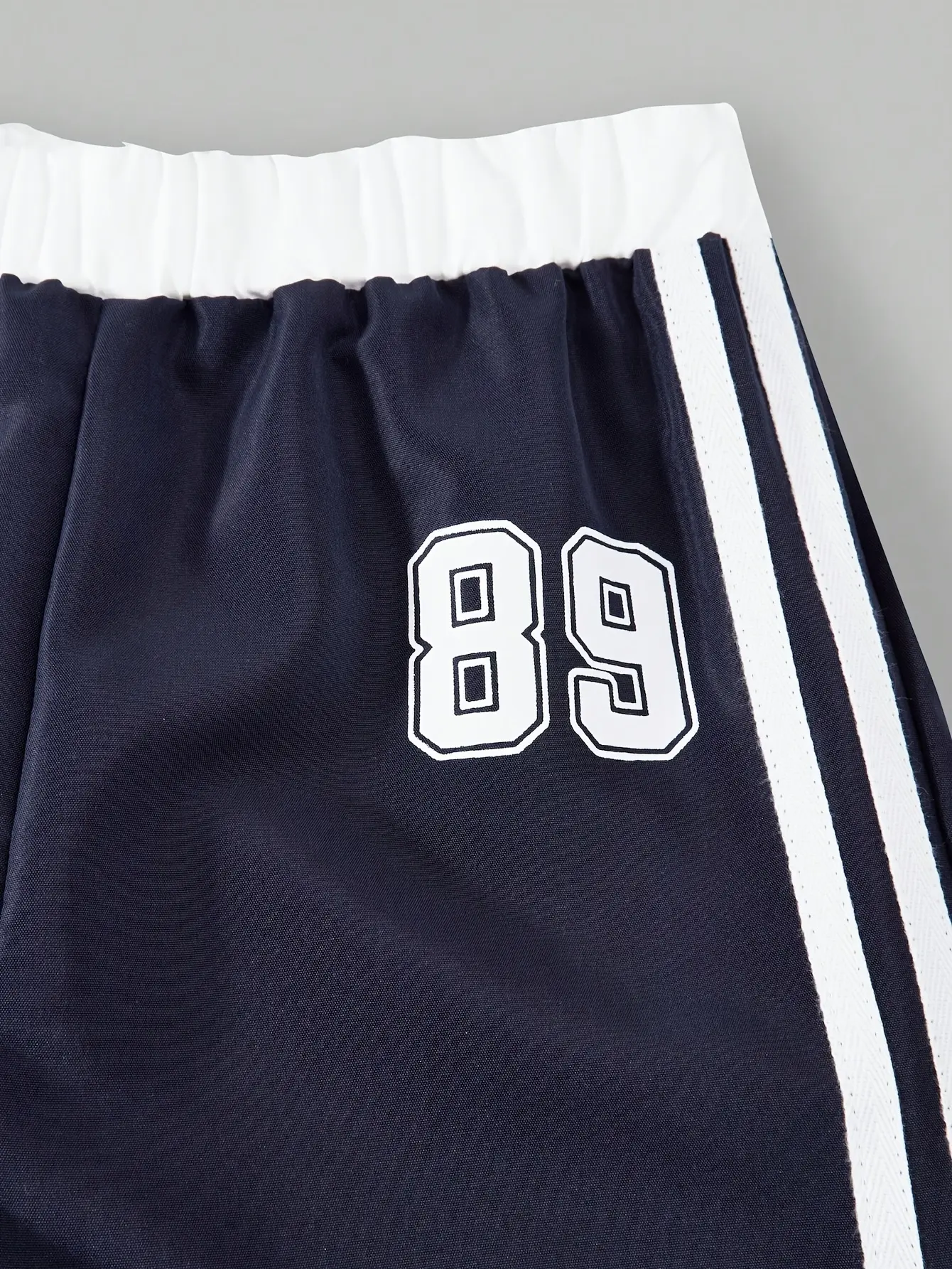 Detail view of Girls Layered Cami Top and Wide Leg Pants 2-Piece Set by LUNORIANA
