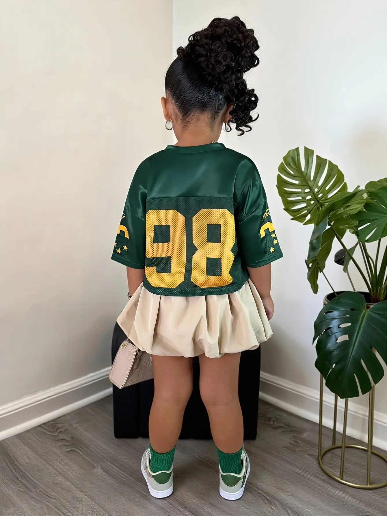 Detail view of Girls 98 Graphic T-Shirt and Solid Skirt 2-Piece Set by LUNORIANA