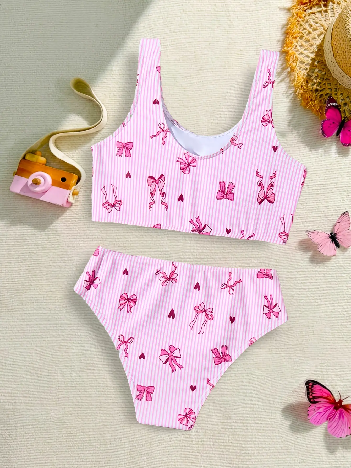Detail view of Girls Pink Bow Stripe Tankini Swimsuit 2-Piece Set by LUNORIANA