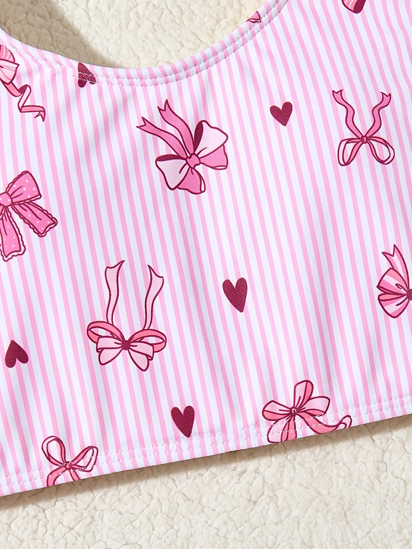 Detail view of Girls Pink Bow Stripe Tankini Swimsuit 2-Piece Set by LUNORIANA