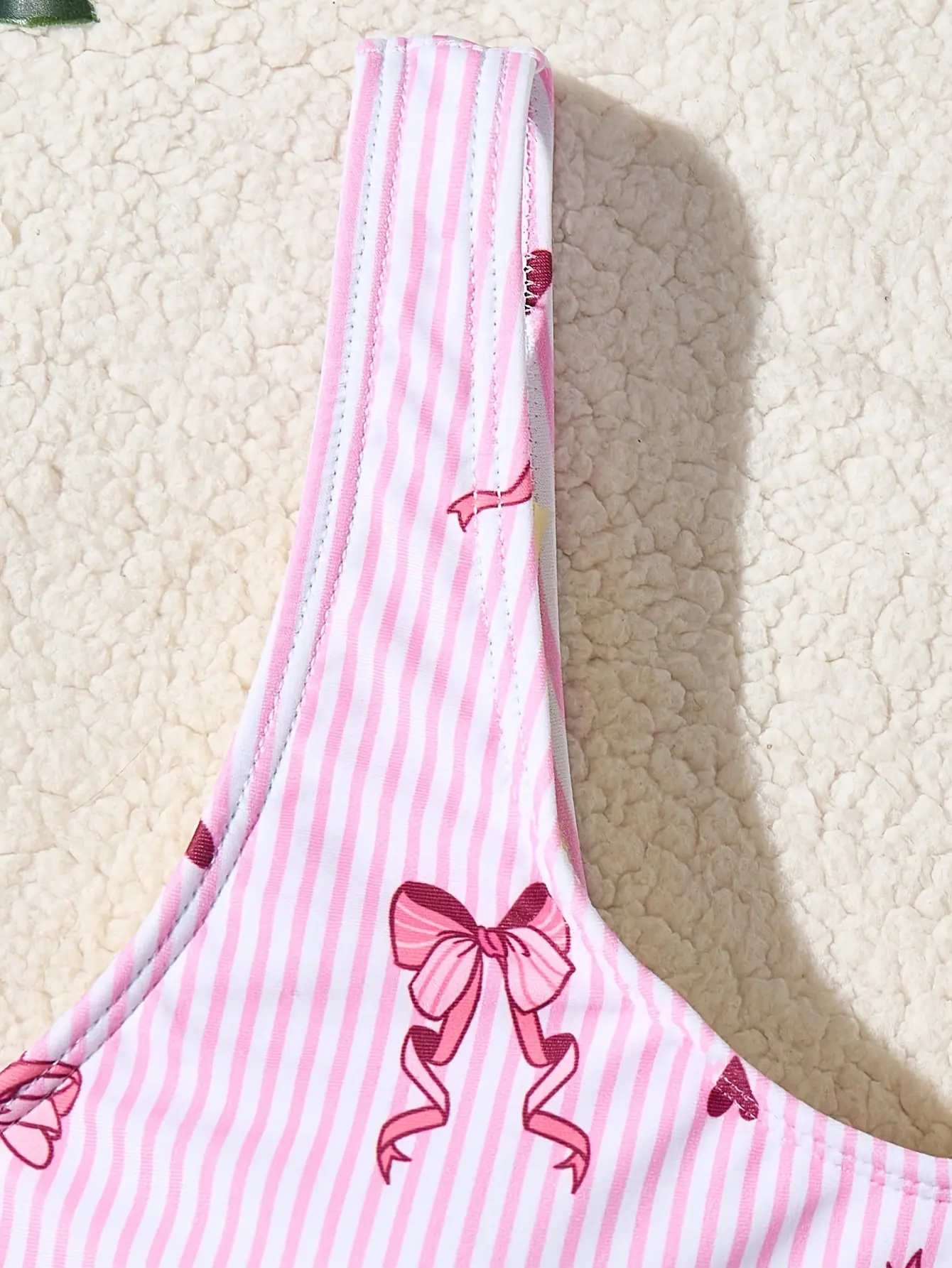 Detail view of Girls Pink Bow Stripe Tankini Swimsuit 2-Piece Set by LUNORIANA
