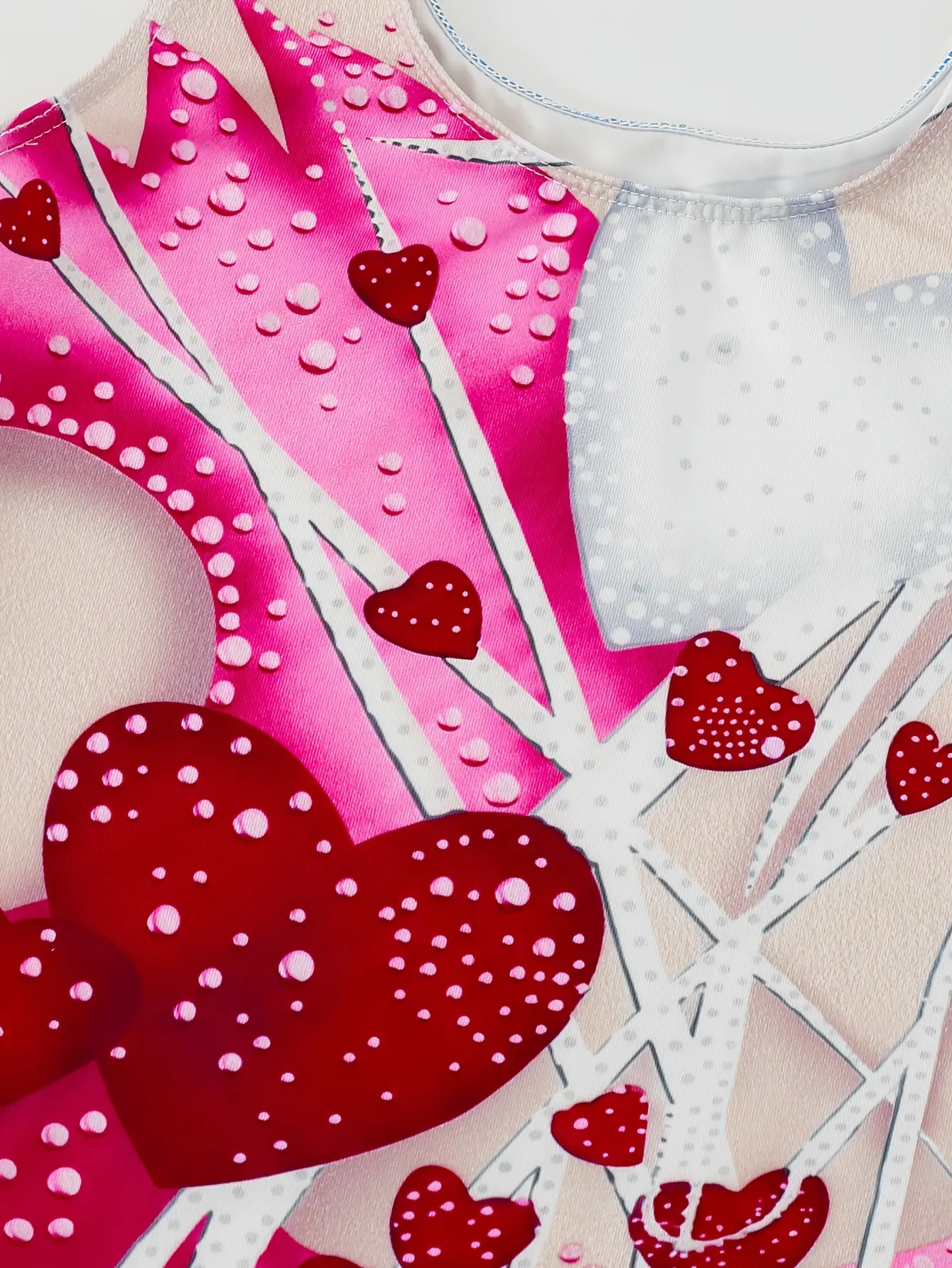 Detail view of Girls Heart Print Sleeveless Unitard, Stretch Gymnastics Outfit by LUNORIANA