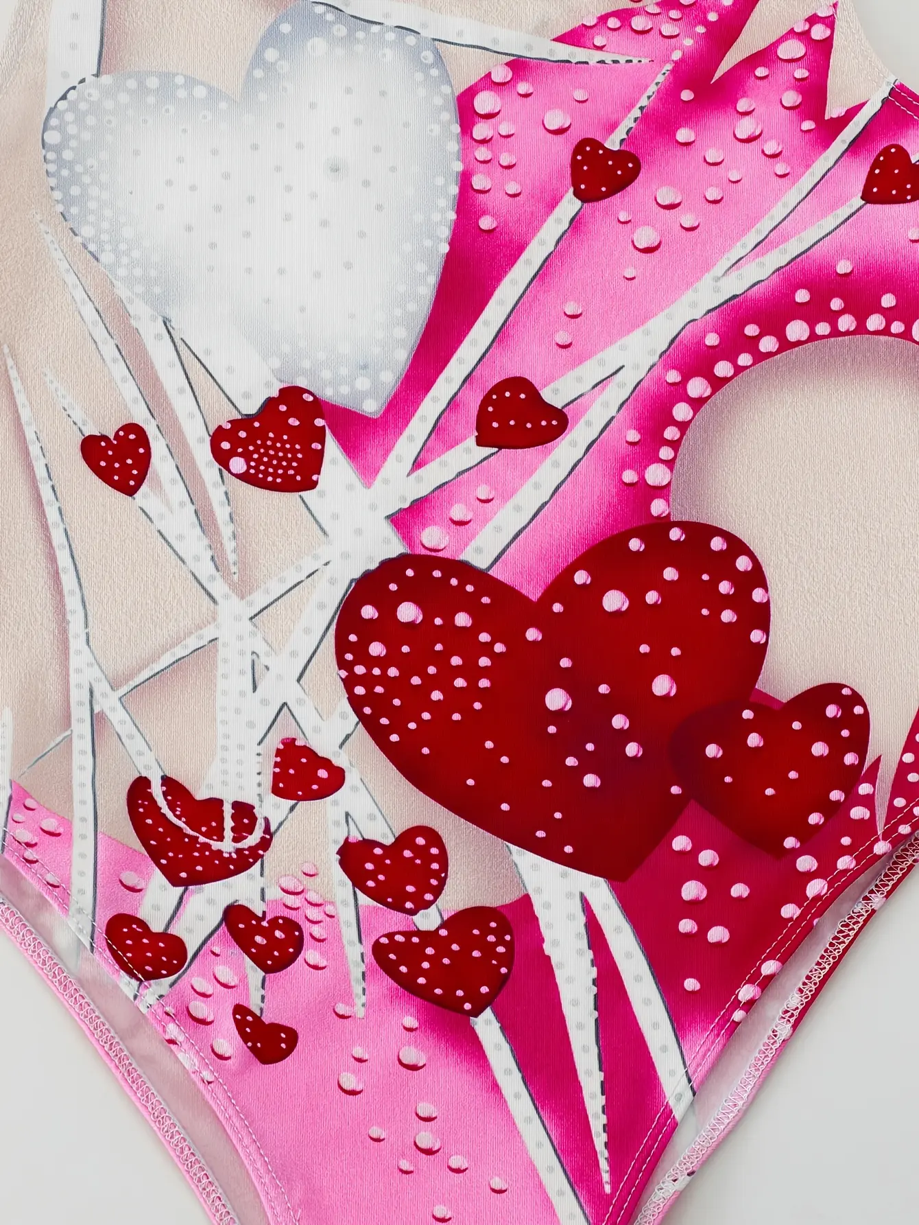 Detail view of Girls Heart Print Sleeveless Unitard, Stretch Gymnastics Outfit by LUNORIANA