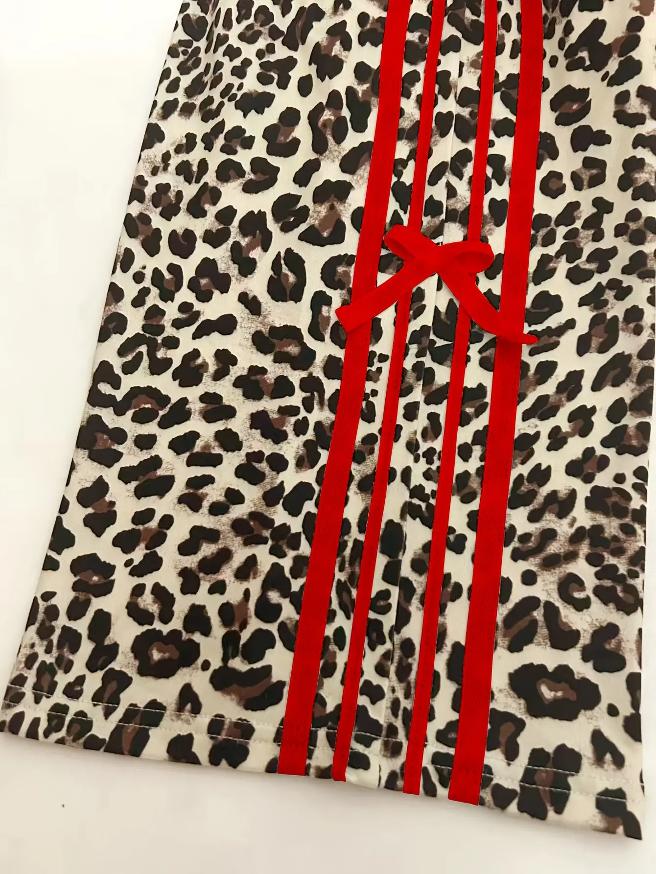 Detail 2 of Girls Leopard Print Wide Leg Pants with Bow Ribbon Detail by LUNORIANA