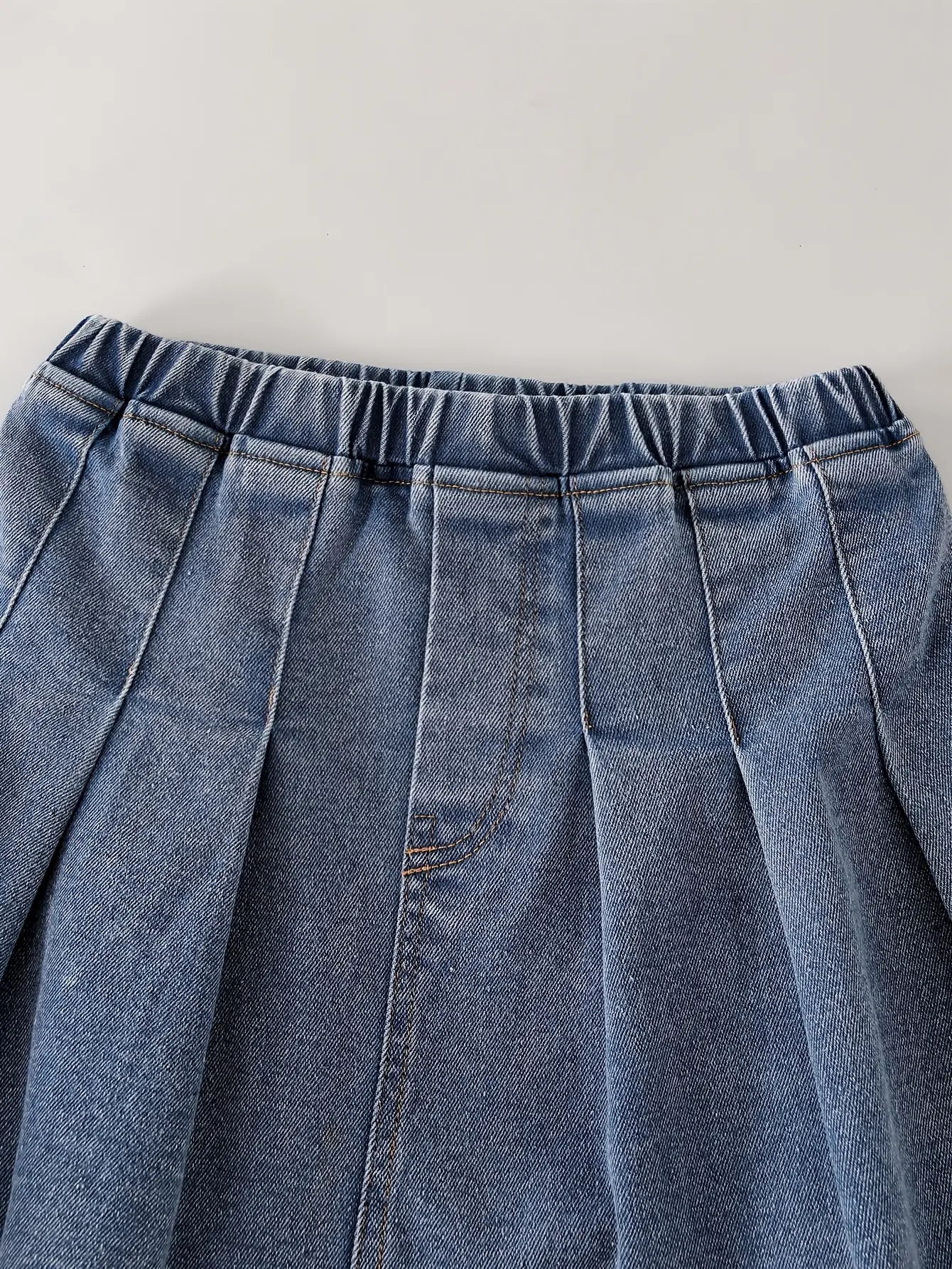 Detail view of Girls Denim Cami Top and Pleated Skirt Set by LUNORIANA