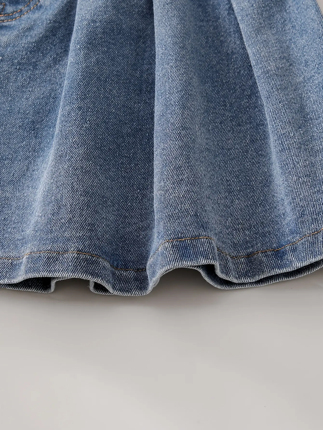 Detail view of Girls Denim Cami Top and Pleated Skirt Set by LUNORIANA
