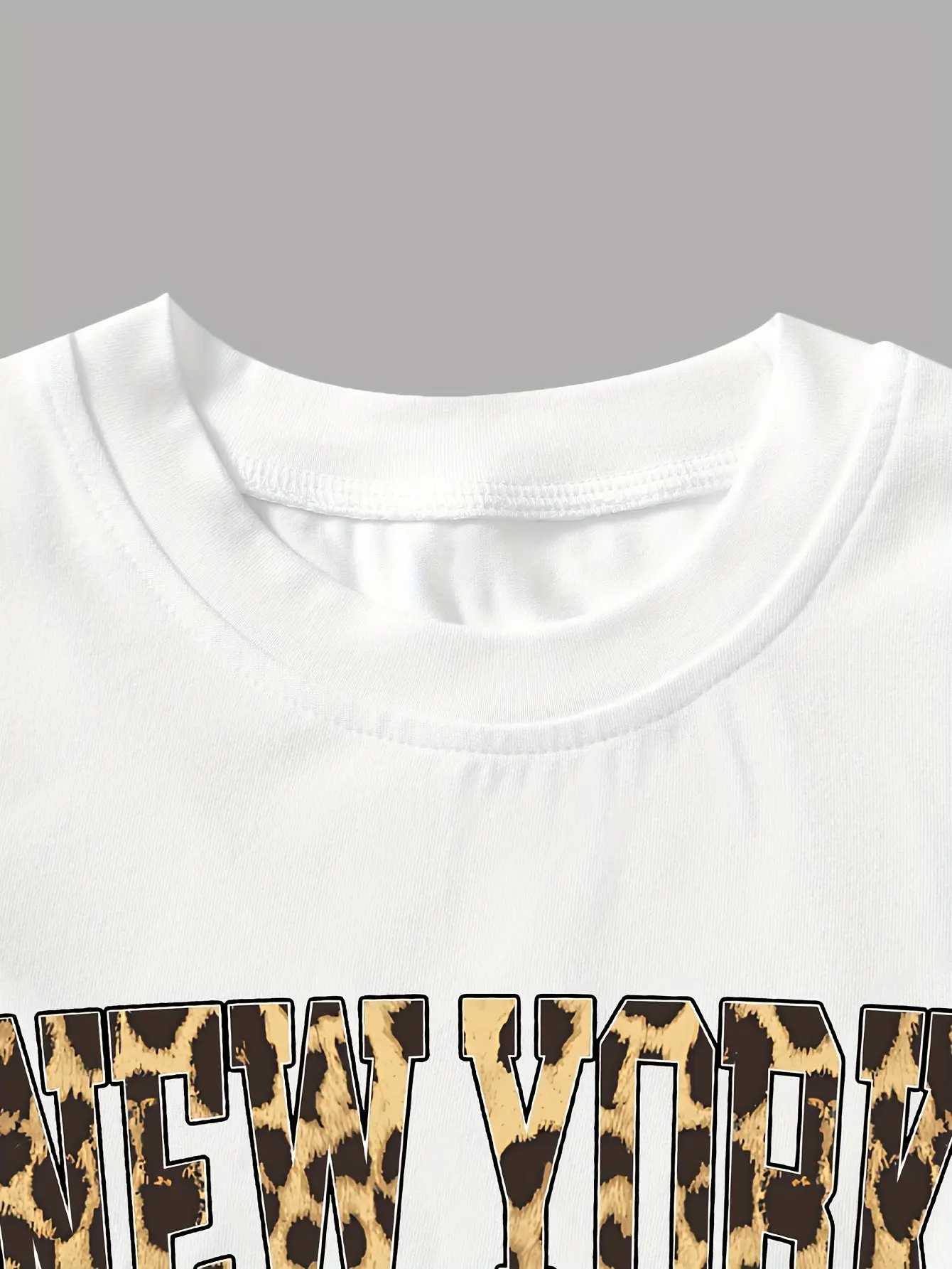 Detail view of Girls Letter Print Top and Leopard Bow Pants Set by LUNORIANA