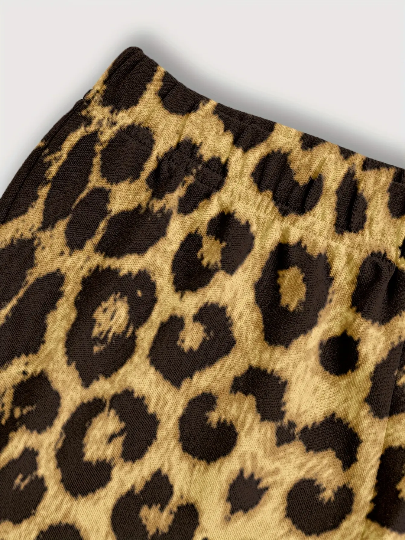 Detail view of Girls Letter Print Top and Leopard Bow Pants Set by LUNORIANA