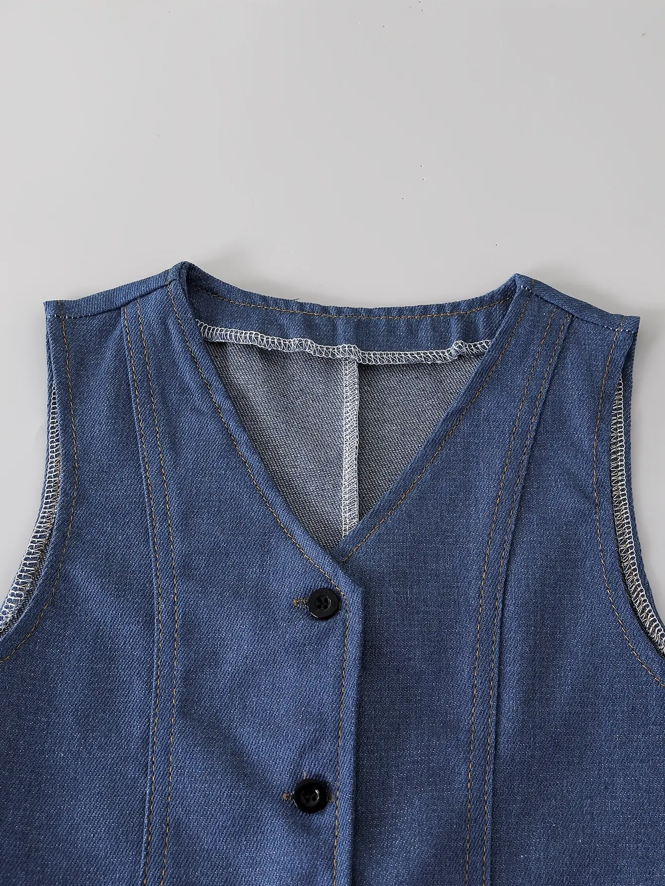 Detail view of Girls Denim Vest and Pocket Shorts Set by LUNORIANA