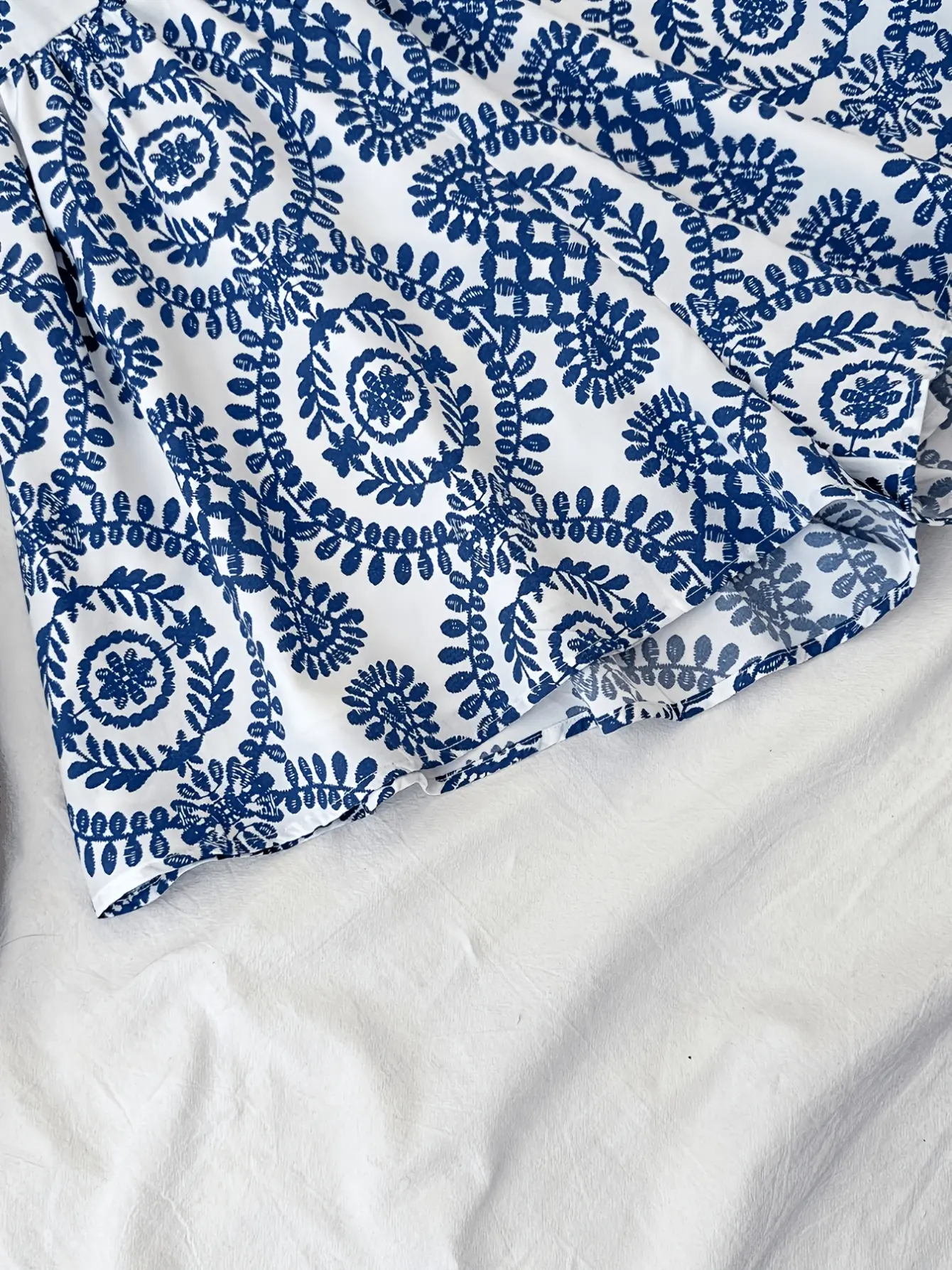 Girls Blue Floral Open Back Romper Dress detail view