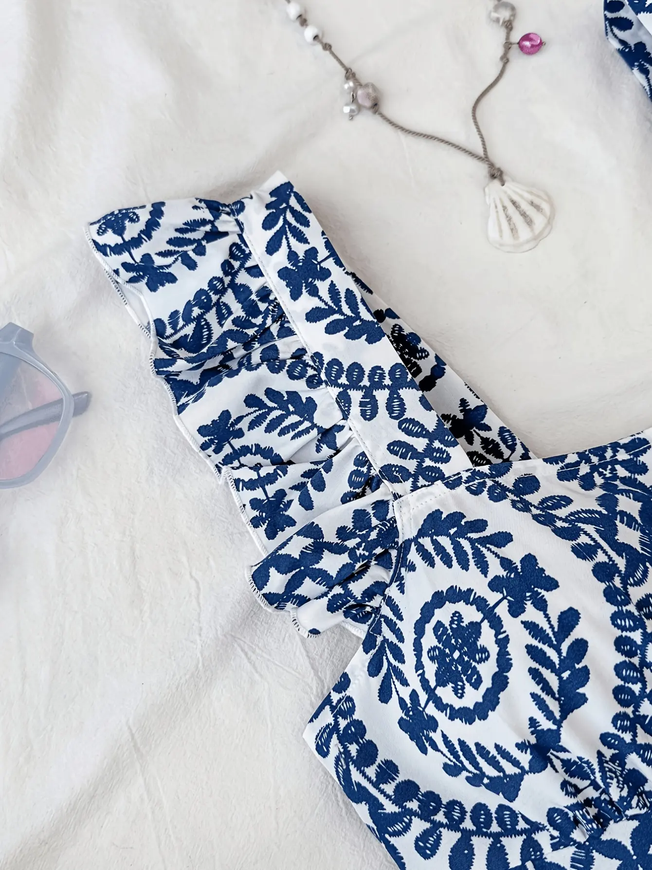 Girls Blue Floral Open Back Romper Dress detail view