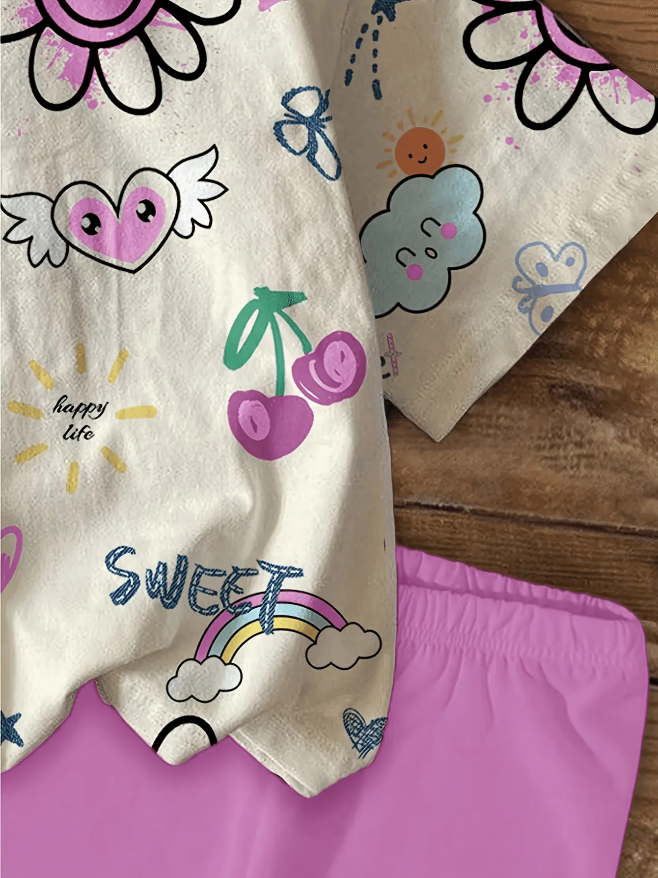 Girls Graphic Tee and Purple Biker Shorts Set detail view