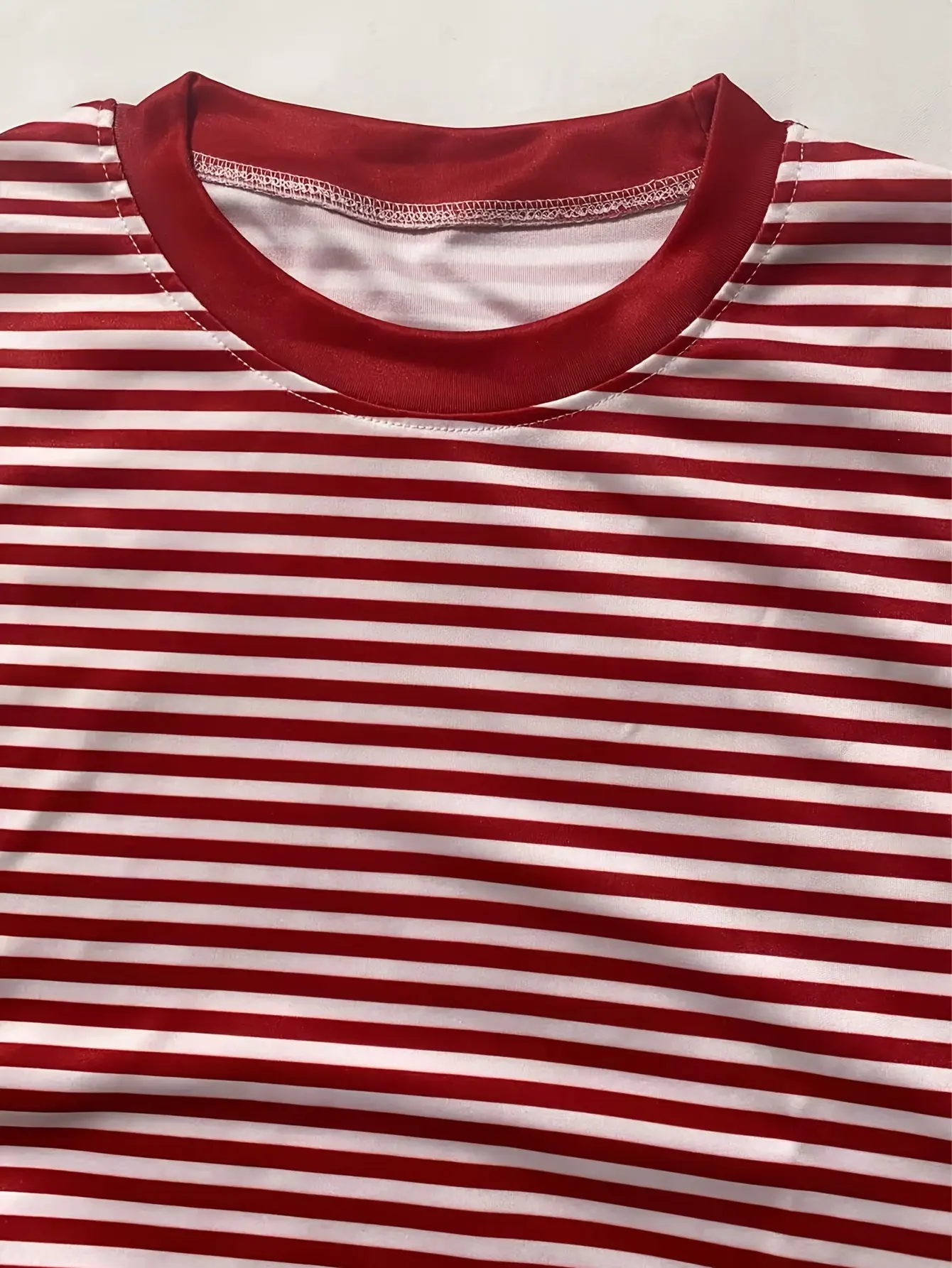 Women’s red striped drop-shoulder T-shirt fabric detail