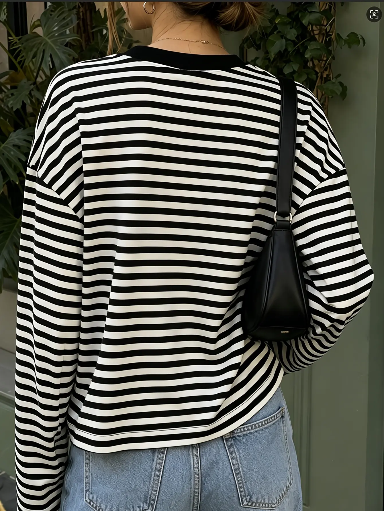 Women’s black striped drop-shoulder T-shirt rear view