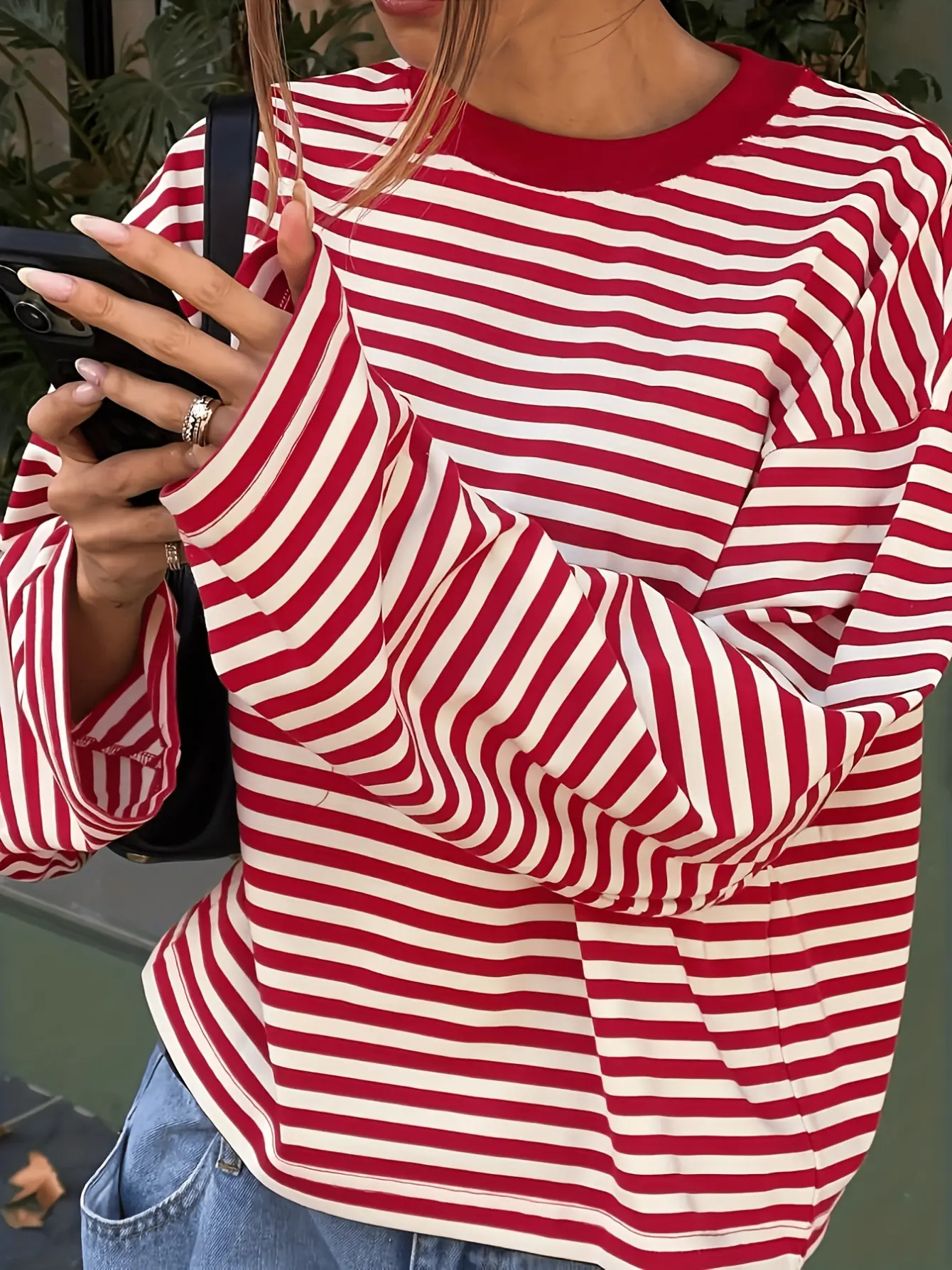 Women’s red striped drop-shoulder T-shirt sleeve detail