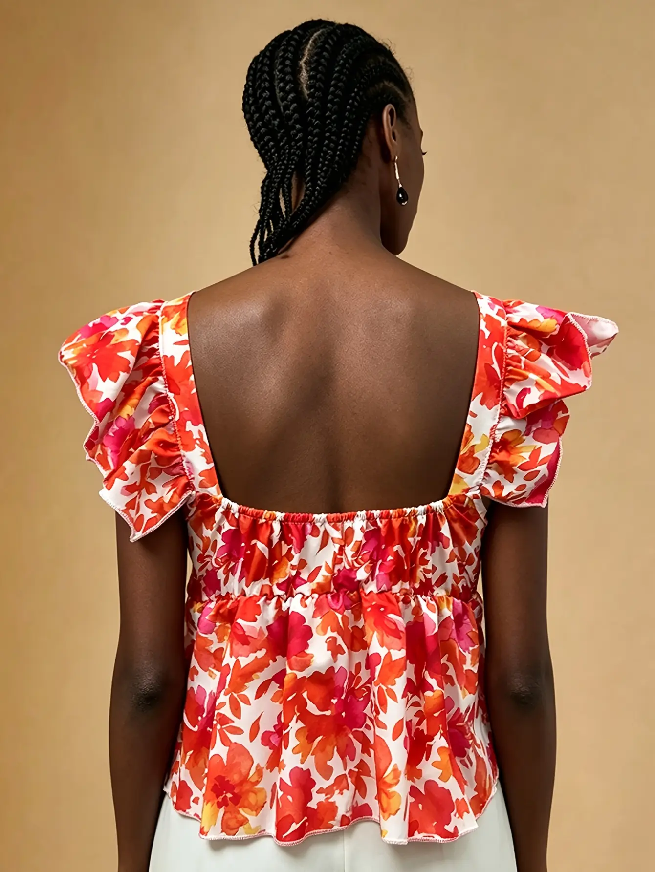 Women’s orange floral wide-strap ruffle top back view