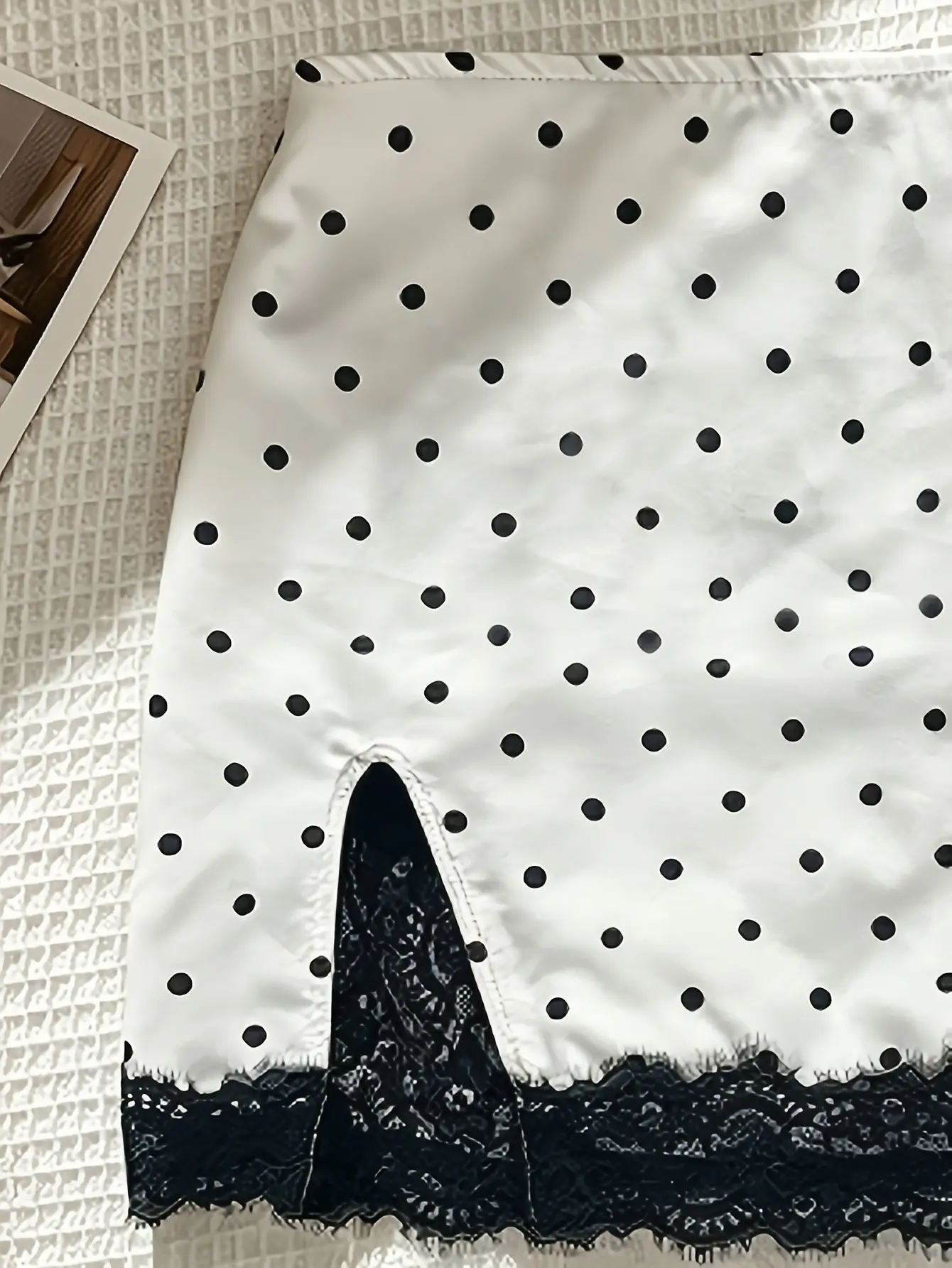 White polka-dot skirt with black lace trim