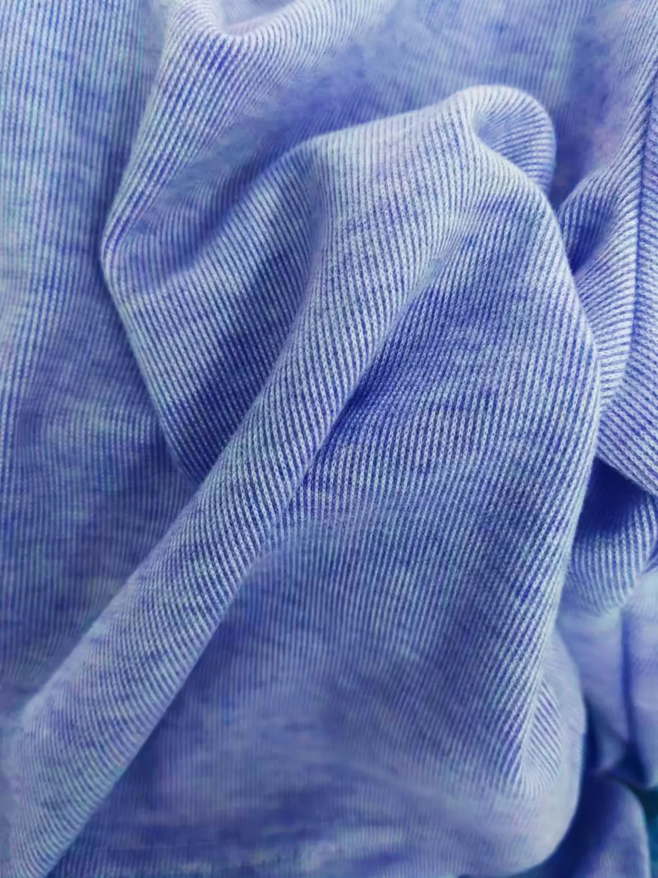 Close-up of blue ribbed knit fabric